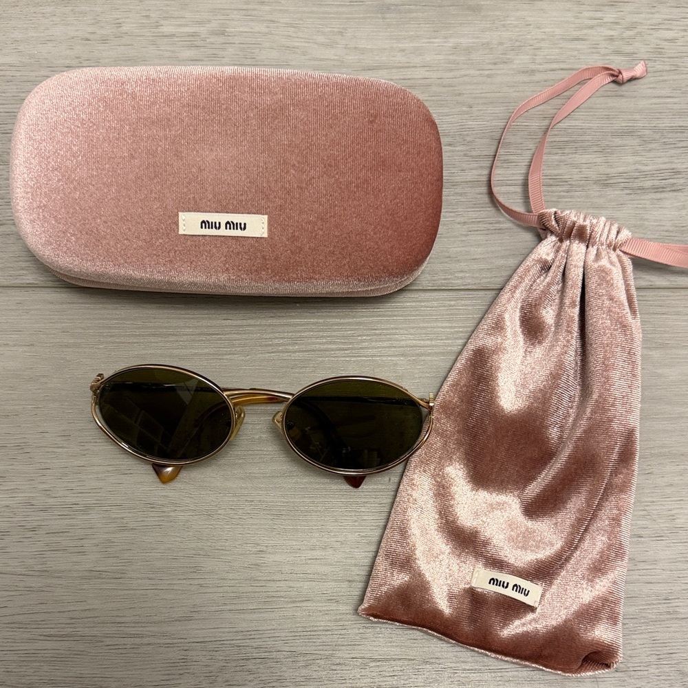 Miu Miu Round Sunglasses
